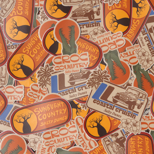 Collection of themed stickers with various designs and text.